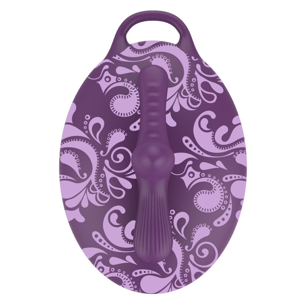 Purple decorative item with paisley pattern on a white background that you can sit on a ride!