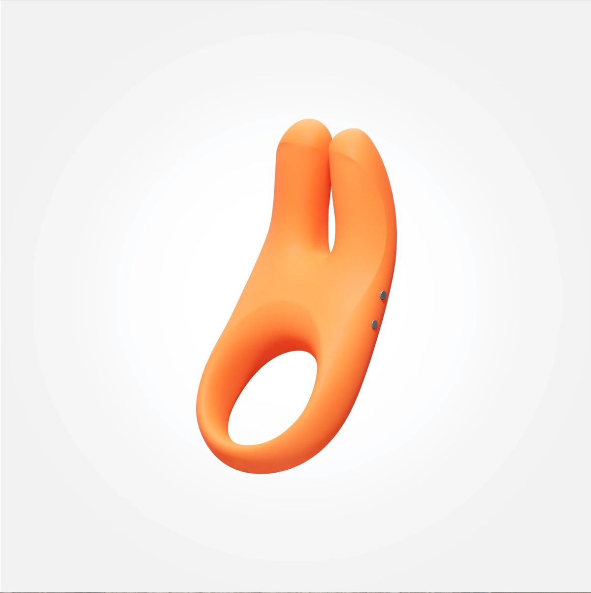 An orange silicone dual-stimulation cock ring vibrator with a smooth matte finish, shown on a solid white background.