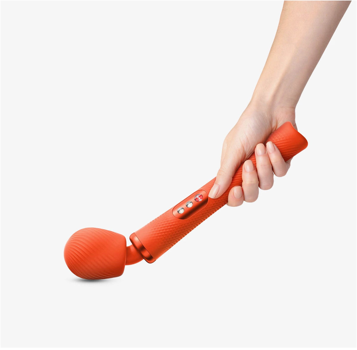 A hand holding an orange silicone wand-style massager against a clean white background.